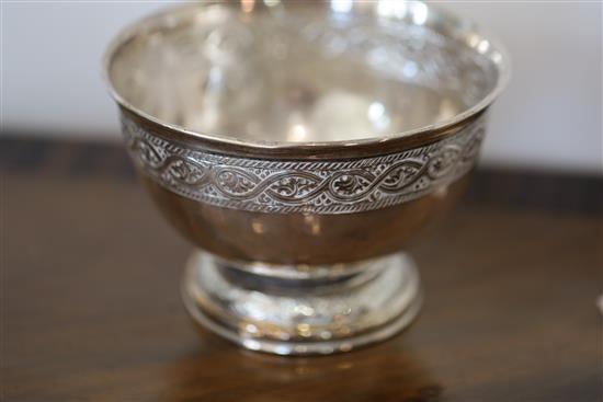 A silver rose bowl, engraved with bands of scrolling acanthus, Liberty & Co, Birmingham 1917 and three pairs of silver specimen vases,